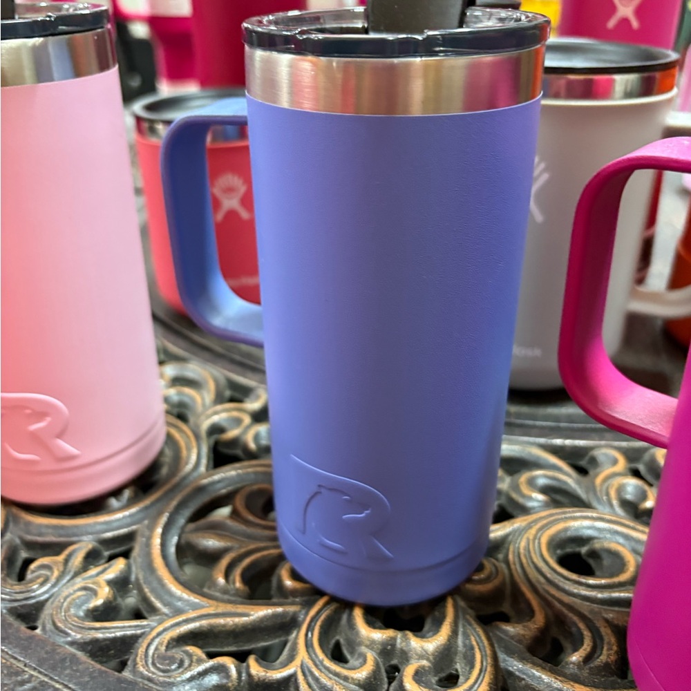Rtic blue slim coffee cup with sip lid, never used. It’s 16 oz.